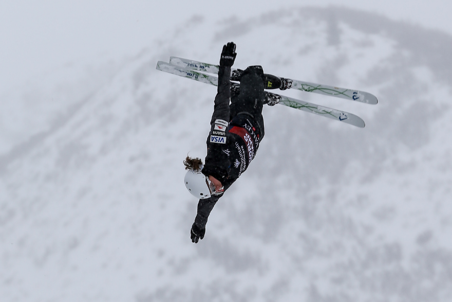 Ashley Caldwell U.S. Olympic Skier jumping off a ramp doing aerials